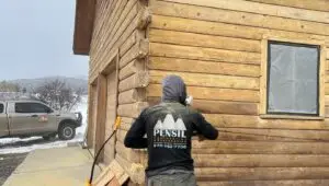 Media Blasting a Log Cabin