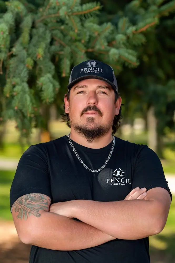 Michael Davis, Foreman at Pencil Log Pros, working on log home restoration projects in the Colorado mountains.