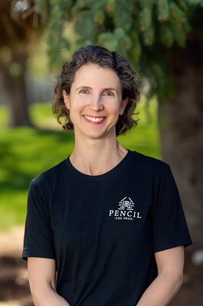 Rhonda Gant, Office Manager at Pencil Log Pros, smiling in the company office in Grand Junction, Colorado.