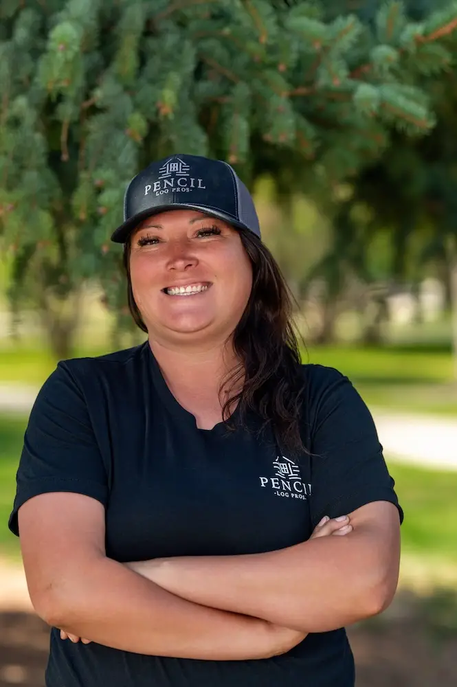 Rose Sutton, Foreman at Pencil Log Pros, working on a log home restoration project in the Colorado mountains.